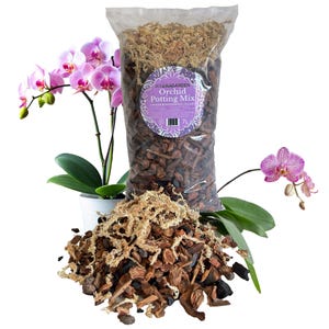 May include: A bag of orchid potting mix with a purple label. The label reads "HydraGarden Orchid Potting Mix". A pile of the mix is in front of the bag, with a potted orchid plant with pink flowers to the left and right.