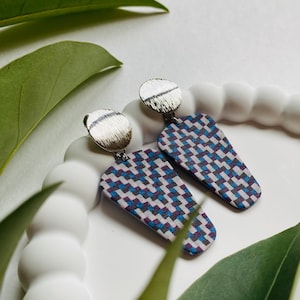 Polymer clay earrings with a Bargello embroidery design