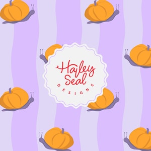 May include: A repeating pattern of orange pumpkins on purple snail bodies against a lavender striped background. The design includes the text "Hailey Seal Designs" in a circular emblem.