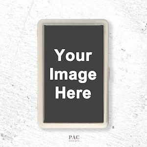 May include: A rectangular silver-toned metal case featuring a central dark grey panel with the white text Your Image Here printed in the centre. Below the case, the text PAC Designs is printed in small black letters on the surface.