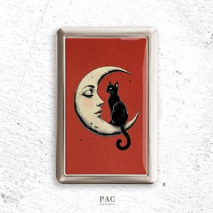 Portasigarette con gatto nero e volto di luna
