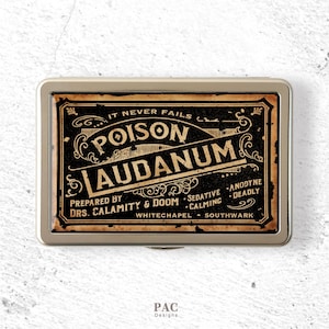May include: A rectangular metal case with a vintage-style label featuring the text POISON LAUDANUM, IT NEVER FAILS, PREPARED BY DRS. CALAMITY & DOOM, SEDATIVE, CALMING, ANODYNE, DEADLY, WHITECHAPEL, SOUTHWARK, and PAC DESIGNS in black and tan colours.