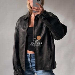 Oversized schapenvachtleren jas jaren 90, vintage bikerstijl