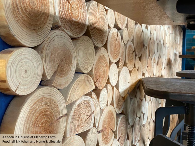 Locally sourced natural wood Log Wall Tiles from The Log Basket clad a sit-up breakfast bar and pizza oven servery area in the restaurant area of Flourish Glenavon Foodhall and Kitchen.