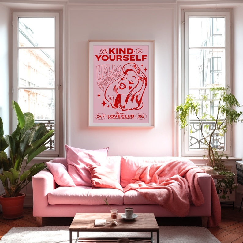May include: Pink and red poster with a cartoon woman and the text "Be Kind to Yourself. Hello Gorgeous. The Self Love Club 24/7 365. Because You Are Worthy."