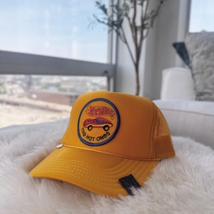 Hot Wheels Inspired Yellow Trucker Hat with Tire Patch and Racing Charm