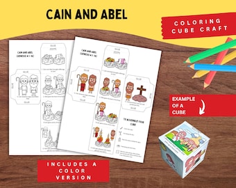 May include: A printable paper craft set featuring Cain and Abel, including black-and-white and color templates to assemble a cube. The sheets contain illustrations of biblical scenes, instructions, and text labels for gluing, along with a finished cube.
