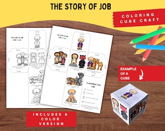 May include: A craft kit with the text "THE STORY OF JOB" and "COLORING CUBE CRAFT". The kit includes coloring pages with illustrations and instructions to assemble a cube. Colored pencils and an example cube are also shown.