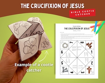 Op de afbeelding: Een papieren kootje met zwarte lijntekeningen en de tekst "THE CRUCIFIXION OF JESUS" en "BIBLE COOTIE CATCHER". Ernaast ligt een bedrukt vel met instructies en illustraties.