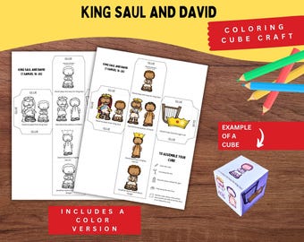 May include: A printable colouring cube craft titled King Saul and David featuring black and white line art templates and a full-colour version. The sheets include illustrations of biblical figures, a harp, and a crown, with instructions to cut, fold, and glue.