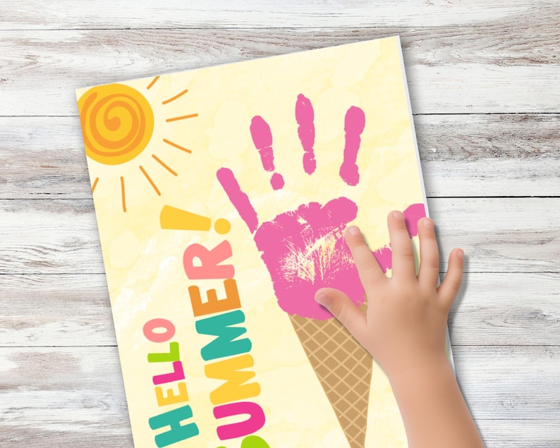 May include: A yellow sun with orange rays and a pink handprint on a yellow background. The handprint is inside a brown and white waffle cone. The text "HELLO SUMMER!" is written in colourful letters.