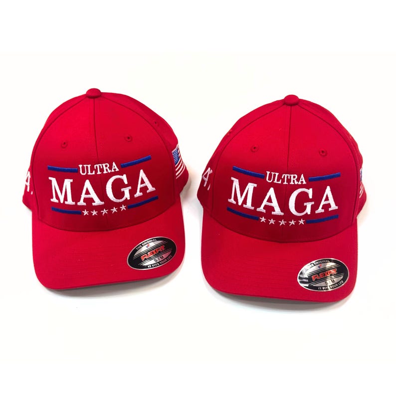 May include: Two red baseball caps with white embroidered text that reads "Ultra MAGA" with five stars below the text. The caps have a blue and white American flag on the side.