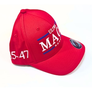 May include: Red baseball cap with white embroidery that says "ULTRA MAGA 45-47".