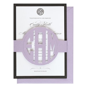 May include: A lavender wedding invitation with a cut-out circle monogram of the letters "EAM" in black. The text "Together with our families Emily Ruth and Michael Harrison" is printed on the invitation.