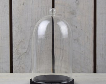 Cloche cloche ronde faite main EMH en verre transparent avec bouton et base en bois noir 17,5 x 10 cm