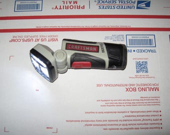 Linterna LED Craftsman Nextec NUEVA, luz de trabajo, batería incluida, cabezal ajustable... Solo batería y linterna, cargador (viejo)