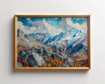 May include: A framed painting of two white bighorn sheep standing on a rocky mountain peak. The sheep are looking out at a snow-capped mountain range in the distance. The sky is a vibrant blue with fluffy white clouds.