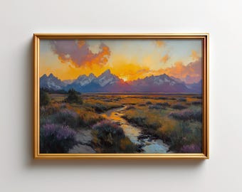 May include: A framed landscape painting depicts a sunset over a mountain range. The sky is filled with orange and yellow clouds. A river flows through a field of green and purple plants. The frame is gold.
