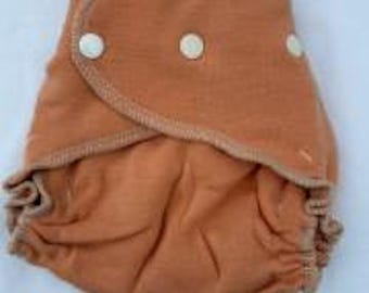 Cobertor de pañal Loveybums Medium Clementine de lana y jersey, apto para bebés de 9 a 22 libras.