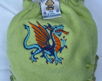 Cobertor de pañal Loveybums grande de lana crepé con dragón bordado en verde manzana, apto para bebés de 8 a 14 kilos.