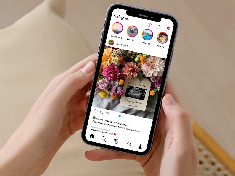 May include: A smartphone displaying an Instagram post announcing a pregnancy with a sonogram image and the text "WE'RE EXPECTING! Baby Stevenson - December 2023". The post is accompanied by a bouquet of colourful flowers.