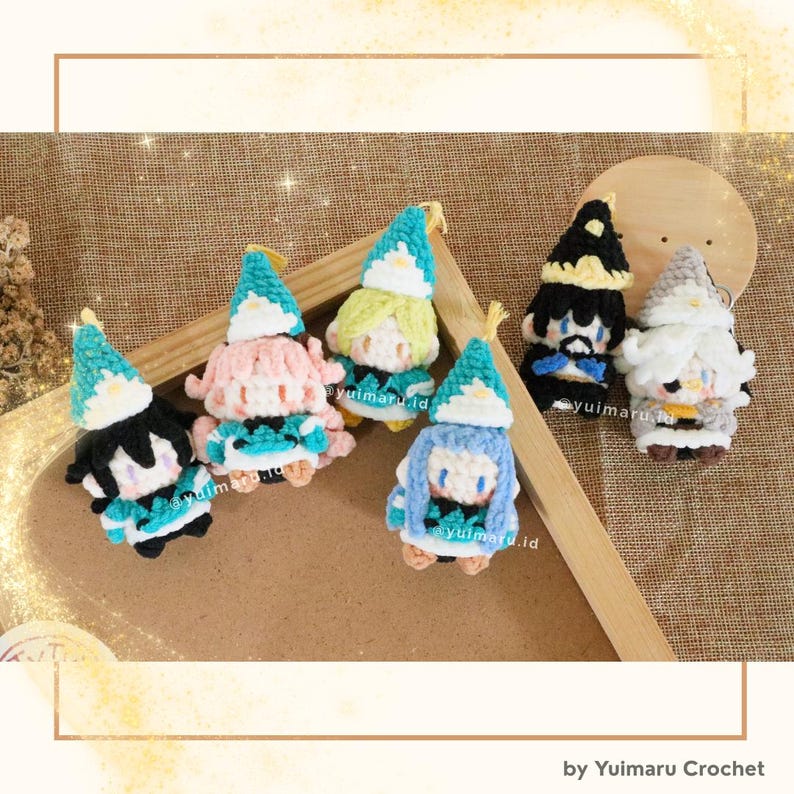 May include: Six small, handmade crochet plush dolls featuring various hair colors and pointed hats with white flower accents. The dolls have distinct facial features and colorful yarn outfits, arranged together on a wooden surface.
