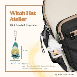 May include: A Witch Hat Atelier mini crochet keychain featuring a small character with a teal hat and yellow hair, measuring 8 cm in height and 4-5.5 cm in width. A second white crochet keychain is attached to a black backpack with a lobster hook.