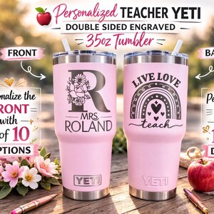 May include: Two pink 35oz Yeti tumblers with engraved designs. One features a floral initial and "Mrs. Roland", the other a rainbow with "Live Love Teach". The tumblers are personalized teacher gifts.