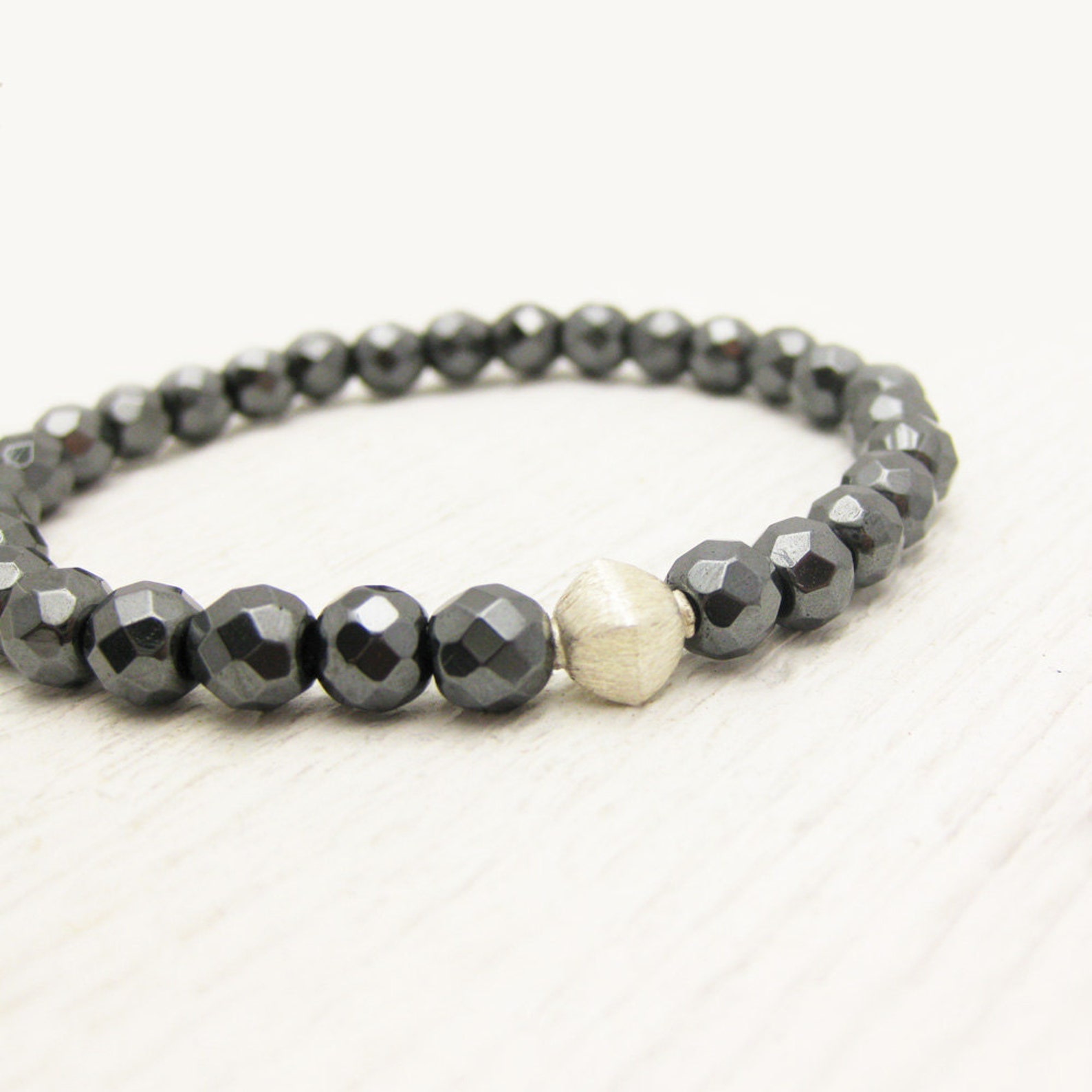 EXTENDS - BRIGHT SILVER FACETED HEMATITE INSPIRE 2MM BEAD BRACELET main image 0