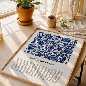 May include: A framed print with a blue and white floral pattern. The print features the text "The Nicene Creed" and includes the full text of the creed.