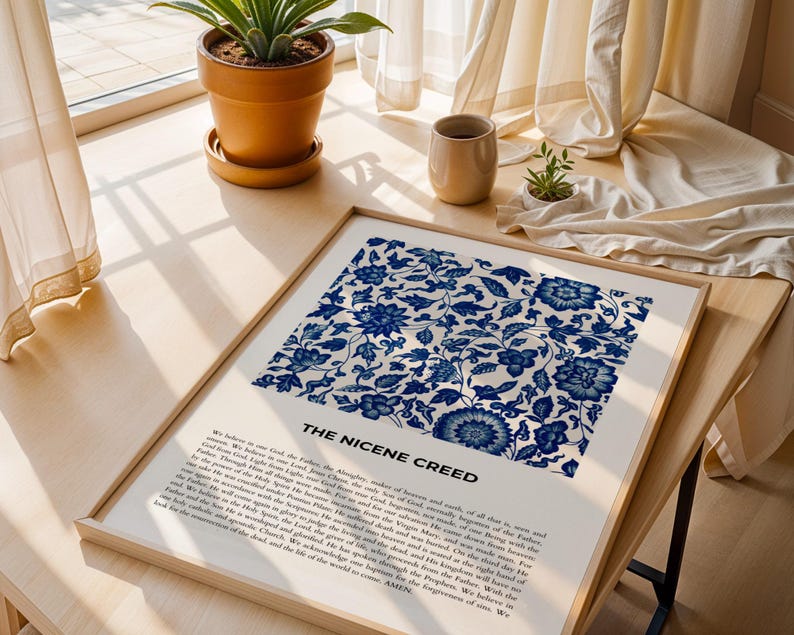 May include: A framed print with a blue and white floral pattern. The print features the text "The Nicene Creed" and includes the full text of the creed.