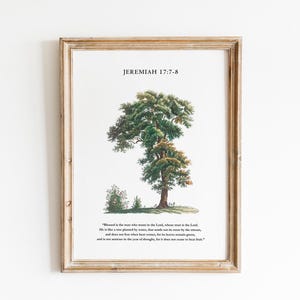 May include: A framed print featuring a watercolour illustration of a tree and the text "JEREMIAH 17:7-8" and a bible verse about a tree planted by water.
