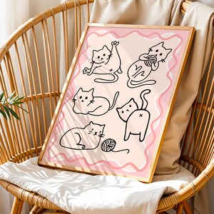ピーチ＆クリーム色の猫のラインアートプリント：モダンな猫好きのためのインテリア
