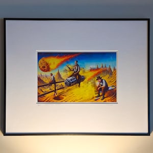 May include: A framed illustration of three figures in a desert landscape. A large, glowing, orange meteor streaks across the sky. The figures are wearing cowboy hats and are standing on a dune. One figure is riding a contraption that looks like a large, metal wheel.