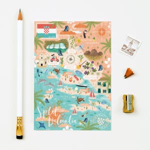 May include: An illustrated map of Split, Dalmatia, with landmarks, sailboats, and marine life. The map includes the Croatian flag and the text "Split Dalmatia". The background is peach and turquoise. The image is surrounded by a pencil and stationery.