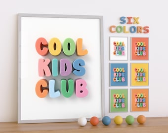 May include: A framed print with the text "COOL KIDS CLUB" in colorful, 3D letters. Six smaller framed prints with the same text in different colors are displayed below the main print. The text "SIX COLORS" is displayed above the smaller prints.