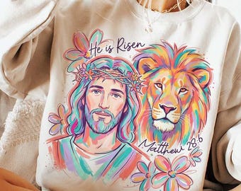 Ele Ressuscitou Jesus Leão Páscoa Mateus 28:6 Camiseta Cristã Floral (Download Digital)