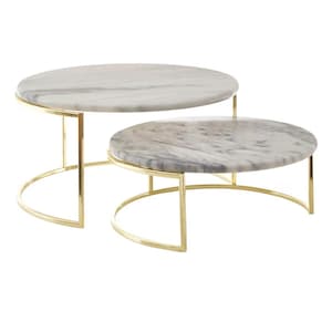 May include: Two-tiered serving stands with round, marble-effect tops and gold-coloured metal frames. The stands are different sizes, with the larger one on top. The marble has grey veining.