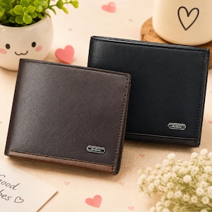 May include: Two leather wallets, one brown and one black, are displayed on a patterned surface. The brown wallet has a contrasting brown bottom edge. Each wallet has a small metal emblem that reads "MenBese".