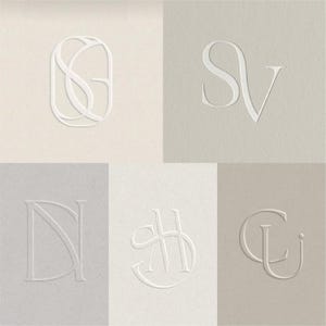 May include: Embossed white monogram designs on neutral backgrounds. Each design features intertwined initials, creating a classic and sophisticated aesthetic. Suitable for branding or stationery purposes.