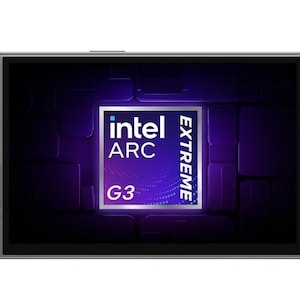 May include: A handheld gaming console with a dark grey casing, featuring a central screen displaying an Intel Arc Extreme G3 logo. The device includes a directional pad, two analogue sticks with light blue rings, and four action buttons labelled A, B, X, Y.