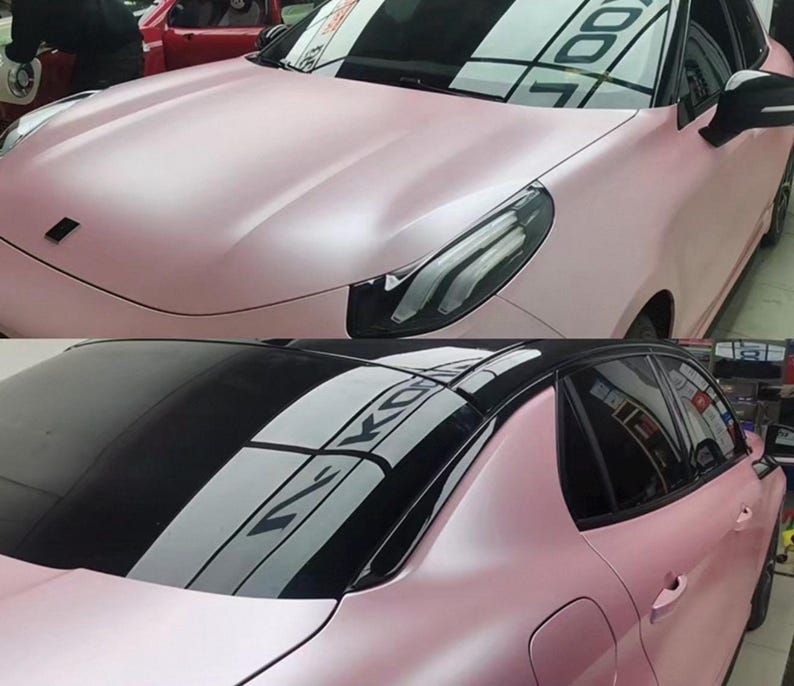 May include: A two-part image showcasing a pink car with a black roof. The car's body has a matte finish. The top image shows the front of the car, while the bottom image shows the rear. The car is parked indoors.