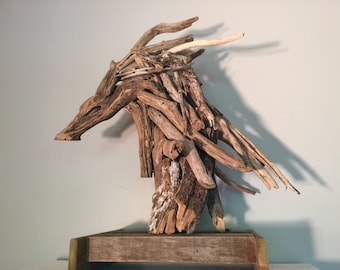 Magnificent and powerful enormous wooden horsehead sculpture.