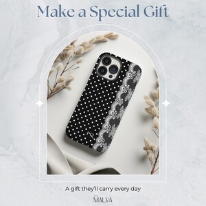 May include: A black smartphone case featuring a white polka dot pattern on the left side and a white lace trim design on the right side. The letters PQ are printed in white near the bottom. The text Make a Special Gift and A gift they&rsquo;ll carry every day are visible.