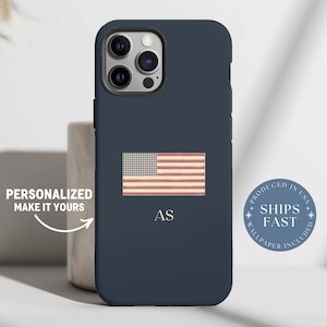 May include: A navy blue phone case featuring a vintage American flag design. The case includes the initials "AS" and the text "PERSONALIZED MAKE IT YOURS". A circular emblem reads "PRODUCED IN USA SHIPS FAST WALLPAPER INCLUDED".