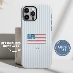 May include: A light blue and white striped phone case featuring an American flag design. The case includes the initials "AS" and the text "PERSONALIZED MAKE IT YOURS". A blue circle with the text "PRODUCED IN USA" and "SHIPS FAST" is also visible.