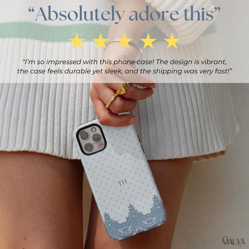 May include: A white phone case with a light blue polka dot pattern, the initials TH in the center, and a decorative blue lace-style border at the bottom. The text Absolutely adore this is visible at the top with five yellow stars below it.