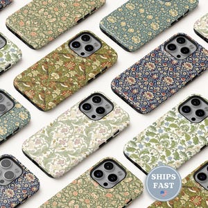 May include: A collection of smartphone cases featuring various intricate floral and botanical patterns in shades of green, blue, cream, and brown. Each case has a triple-lens camera cutout and a circular badge with the text SHIPS FAST.