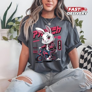 Cute Bunny Biker T-Shirt - Funny Rabbit Motorcycle Rider Tee - Pink Cartoon Animal Graphic Shirt - Whimsical Pet Lover Gift