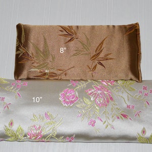 brown and silver satin eye pillow with flax seed and optional lavender buds showing 8 inch and 10 inch sizes